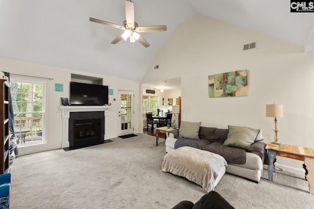 612 Williams Cir, West Columbia, SC 29172 - carpeted living room with high vaulted ceiling, ceiling fan, a fireplace with flush hearth, and a desk