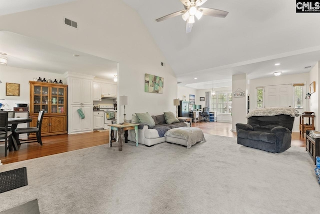 612 Williams Cir, West Columbia, SC 29172 - carpeted living area featuring a ceiling fan, high vaulted ceiling, wood finished floors, and recessed lighting