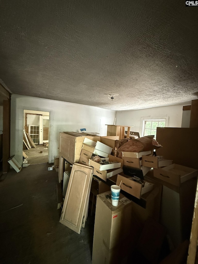 453 Fagan Rd, Winnsboro, SC 29180 - misc room featuring a textured ceiling and dark colored carpet