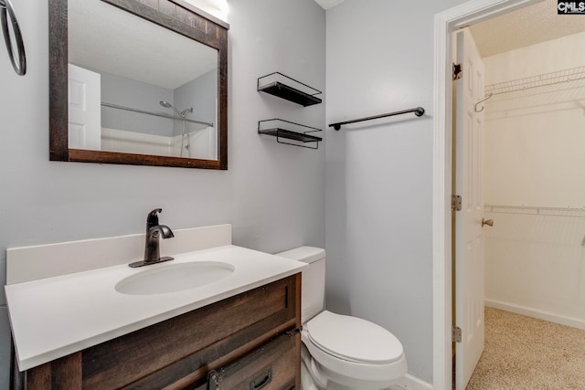 11 Parkhaven Ct, Columbia, SC 29209 - full bathroom featuring vanity, toilet, a spacious closet, and a shower