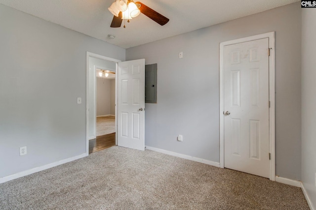 11 Parkhaven Ct, Columbia, SC 29209 - unfurnished bedroom featuring carpet, electric panel, baseboards, and a ceiling fan