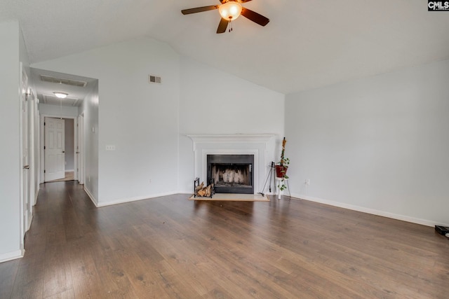 11 Parkhaven Ct, Columbia, SC 29209 - unfurnished living room featuring attic access, a ceiling fan, vaulted ceiling, a fireplace with flush hearth, and wood finished floors