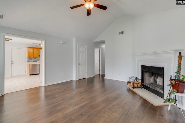 11 Parkhaven Ct, Columbia, SC 29209 - living area featuring ceiling fan, dark wood-style flooring, a fireplace with raised hearth, baseboards, and high vaulted ceiling