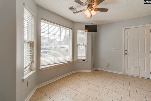 11 Parkhaven Ct, Columbia, SC 29209 - unfurnished room featuring a ceiling fan, plenty of natural light, and a textured ceiling