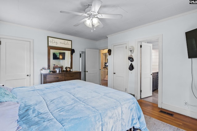 303 N Rudolph St, Saluda, SC 29138 - bedroom featuring wood finished floors, ornamental molding, ceiling fan, and connected bathroom