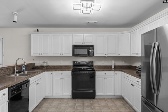 175 Rosecliff Cir, Hopkins, SC 29061 - kitchen with black appliances, a sink, white cabinets, and dark countertops
