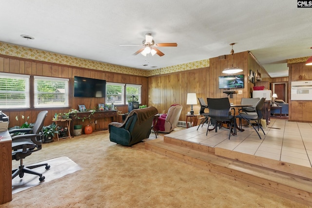 2015 Valley View Rd, West Columbia, SC 29172 - carpeted living area featuring wooden walls and a ceiling fan