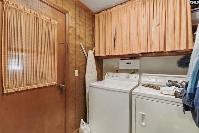 2015 Valley View Rd, West Columbia, SC 29172 - washroom with independent washer and dryer, cabinet space, and a textured ceiling