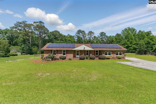 2015 Valley View Rd, West Columbia, SC 29172 - single story home featuring solar panels, driveway, a front yard, and brick siding