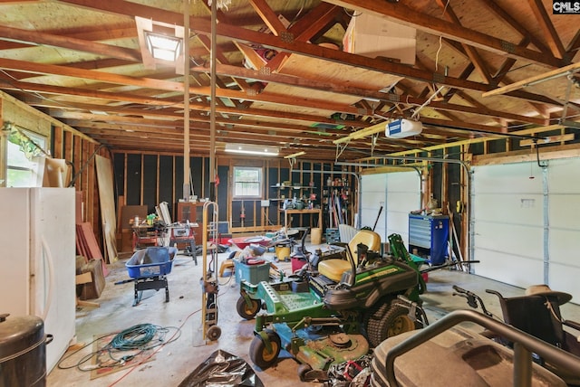 2015 Valley View Rd, West Columbia, SC 29172 - garage with freestanding refrigerator and a garage door opener