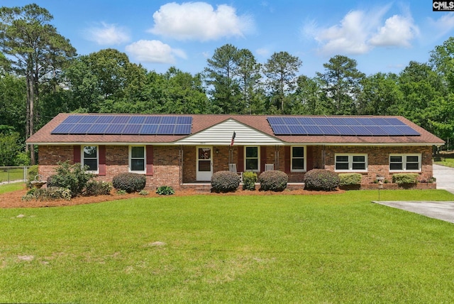 2015 Valley View Rd, West Columbia, SC 29172 - ranch-style house featuring roof mounted solar panels and brick siding