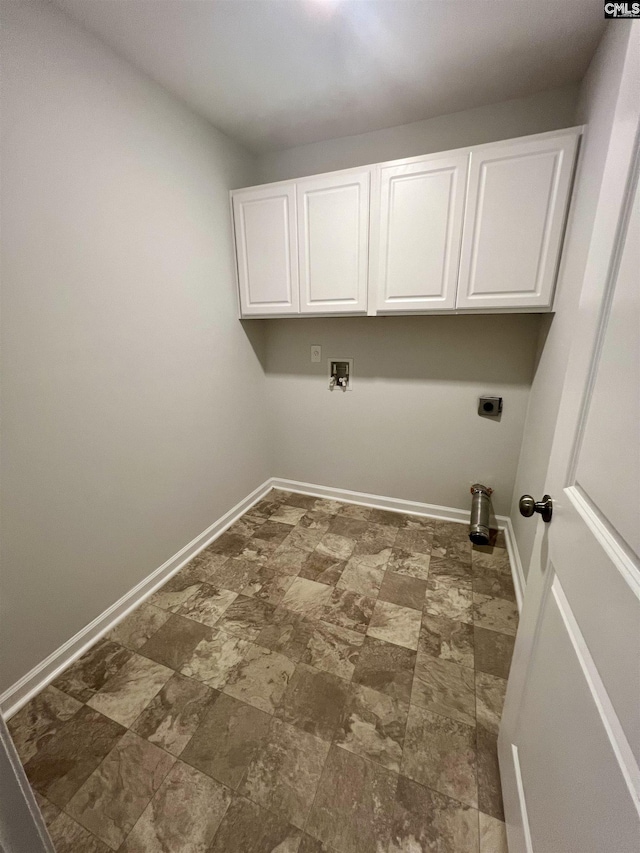 1069 Roscoe Rd, Lexington, SC 29073 - laundry room featuring electric dryer hookup, cabinet space, washer hookup, baseboards, and stone finish flooring