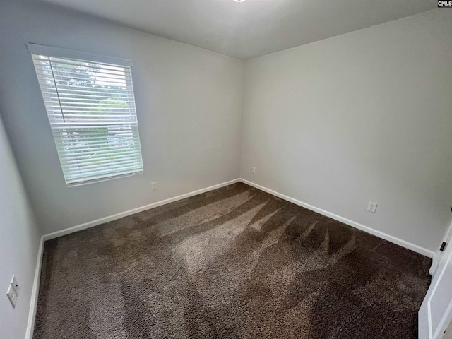 1069 Roscoe Rd, Lexington, SC 29073 - spare room with dark carpet and baseboards