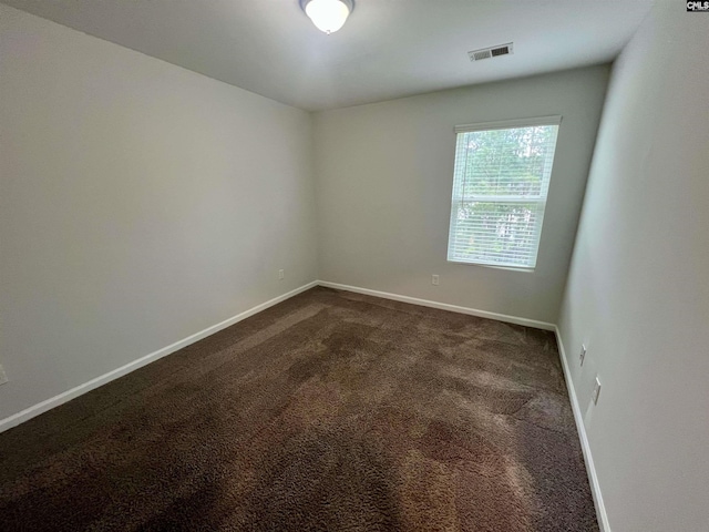 1069 Roscoe Rd, Lexington, SC 29073 - unfurnished room with dark colored carpet and baseboards