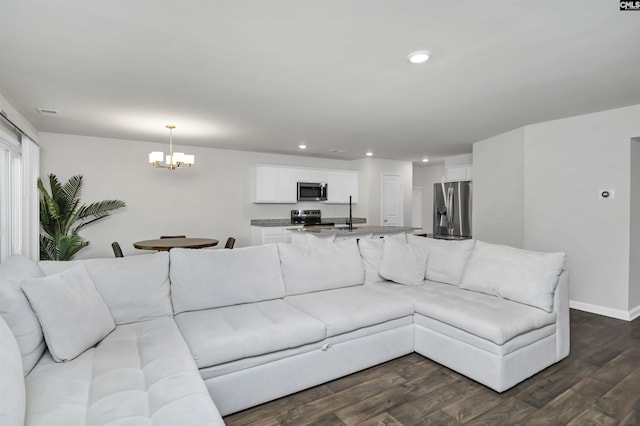 341 Liliana Dr, Columbia, SC 29223 - living area featuring a chandelier, dark wood finished floors, baseboards, and recessed lighting