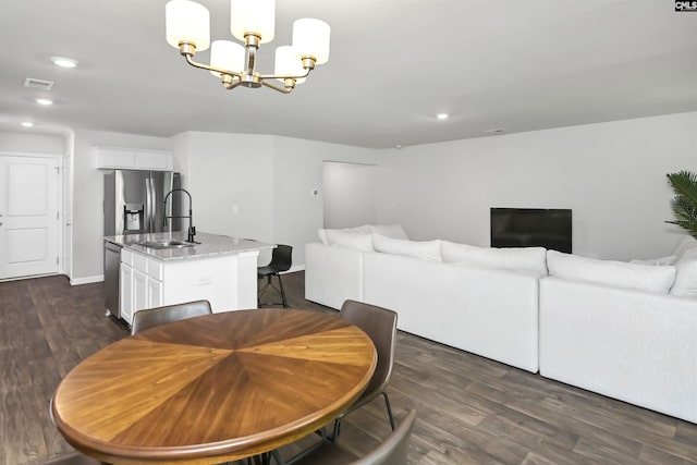 341 Liliana Dr, Columbia, SC 29223 - dining area with dark wood-type flooring, a chandelier, recessed lighting, and baseboards