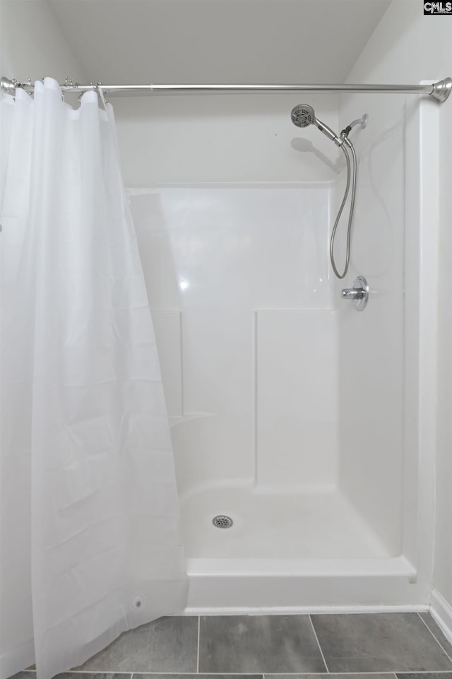 341 Liliana Dr, Columbia, SC 29223 - bathroom featuring tile patterned floors and a shower with shower curtain