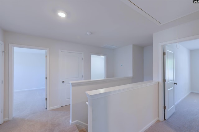 812 Poplar Bend Rd, Columbia, SC 29229 - hallway with attic access, light carpet, an upstairs landing, and baseboards