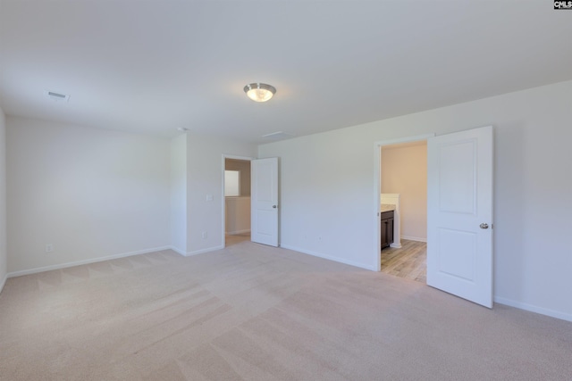 812 Poplar Bend Rd, Columbia, SC 29229 - unfurnished bedroom featuring light colored carpet, baseboards, and ensuite bathroom
