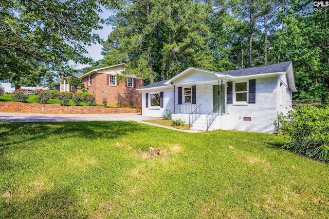 198 Stanford St, Columbia, SC 29203 - ranch-style home with brick siding, a front yard, a porch, and crawl space