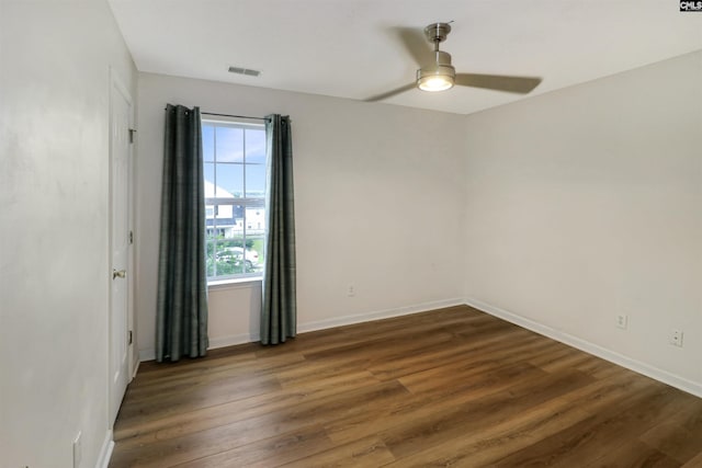 1306 Waverly Place Dr, Columbia, SC 29223 - unfurnished room with dark wood-style floors, a ceiling fan, and baseboards