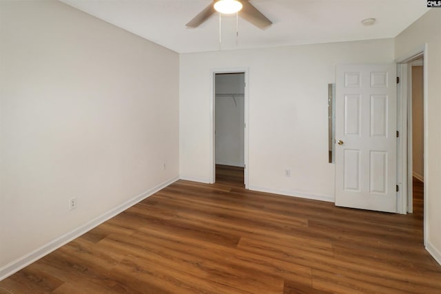 1306 Waverly Place Dr, Columbia, SC 29223 - unfurnished bedroom with wood finished floors, baseboards, and a spacious closet