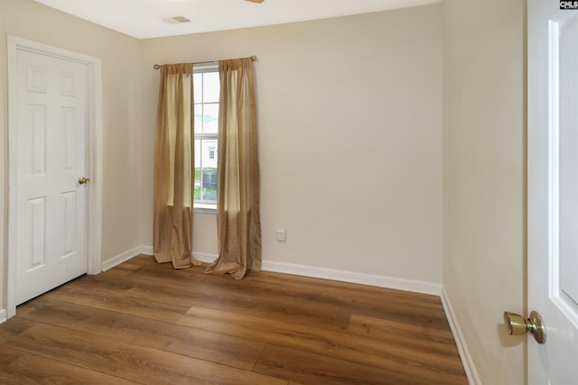 1306 Waverly Place Dr, Columbia, SC 29223 - spare room with hardwood / wood-style floors, baseboards, and plenty of natural light