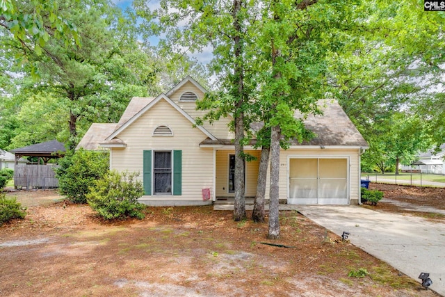 251 Kyzer Rd, Lexington, SC 29073 - view of front facade with a garage, concrete driveway, roof with shingles, and a porch