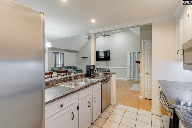 251 Kyzer Rd, Lexington, SC 29073 - kitchen featuring a sink, appliances with stainless steel finishes, dark countertops, open floor plan, and recessed lighting