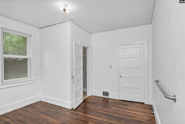 709 Sunset Dr, Columbia, SC 29203 - empty room featuring dark wood-style floors and baseboards