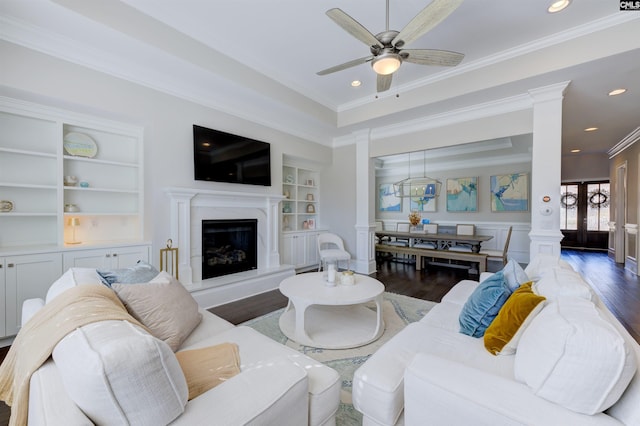 2 Beaver Lake Ct, Elgin, SC 29045 - living room with wood finished floors, built in features, ornate columns, a ceiling fan, and crown molding