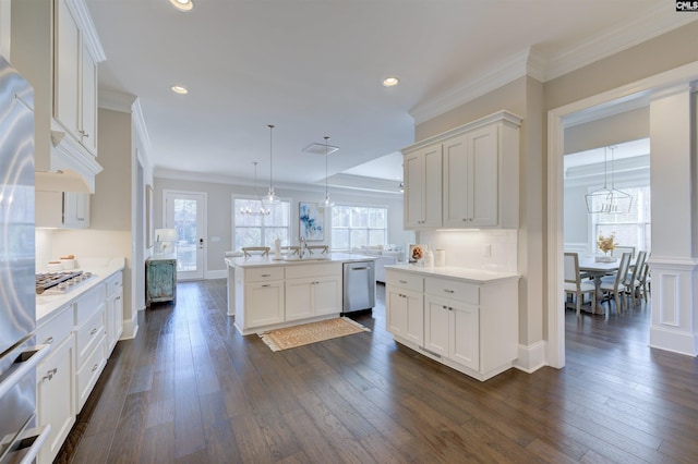 2 Beaver Lake Ct, Elgin, SC 29045 - kitchen with stainless steel appliances, a sink, white cabinets, light countertops, and ornamental molding