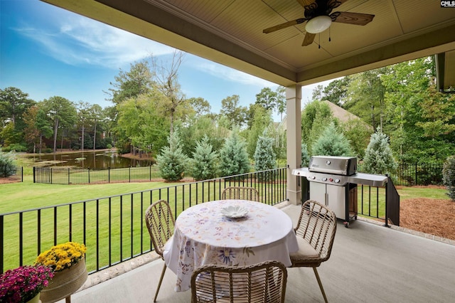 2 Beaver Lake Ct, Elgin, SC 29045 - view of patio featuring a water view, a ceiling fan, view of wooded area, and area for grilling