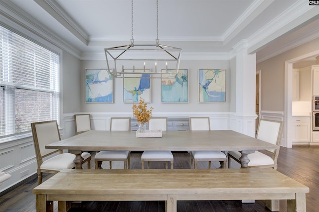 2 Beaver Lake Ct, Elgin, SC 29045 - dining space with a decorative wall, dark wood-style flooring, wainscoting, crown molding, and a chandelier