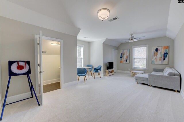 2 Beaver Lake Ct, Elgin, SC 29045 - carpeted living area featuring lofted ceiling, a ceiling fan, and baseboards