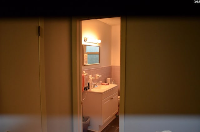 828 Seay Dr, West Columbia, SC 29170 - half bath with vanity, tile patterned floors, and tile walls