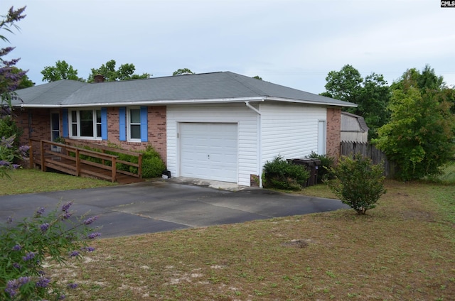 828 Seay Dr, West Columbia, SC 29170 - single story home with an attached garage, brick siding, and asphalt driveway