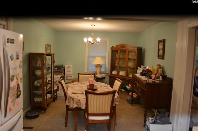 828 Seay Dr, West Columbia, SC 29170 - dining area with a chandelier and carpet