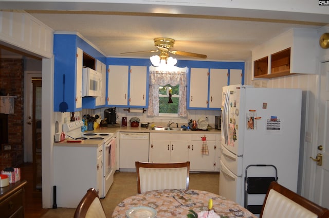 828 Seay Dr, West Columbia, SC 29170 - kitchen featuring white appliances, a ceiling fan, a sink, ornamental molding, and white cabinets
