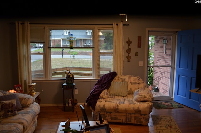 828 Seay Dr, West Columbia, SC 29170 - living room featuring healthy amount of natural light, wood finished floors, and baseboards