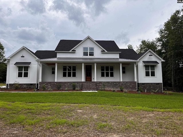1781 Bookman Rd, Elgin, SC 29045 - modern farmhouse style home with crawl space, a standing seam roof, and covered porch
