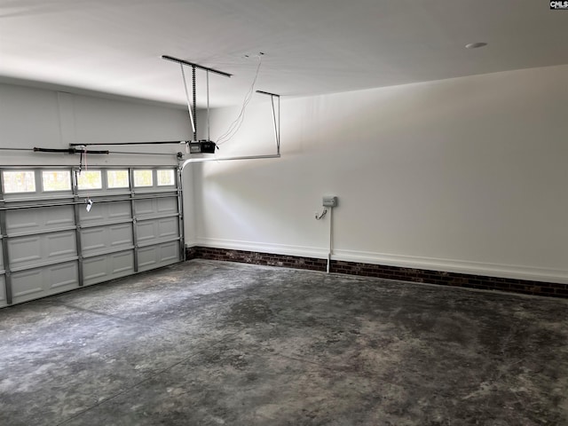 1781 Bookman Rd, Elgin, SC 29045 - garage featuring a garage door opener and baseboards