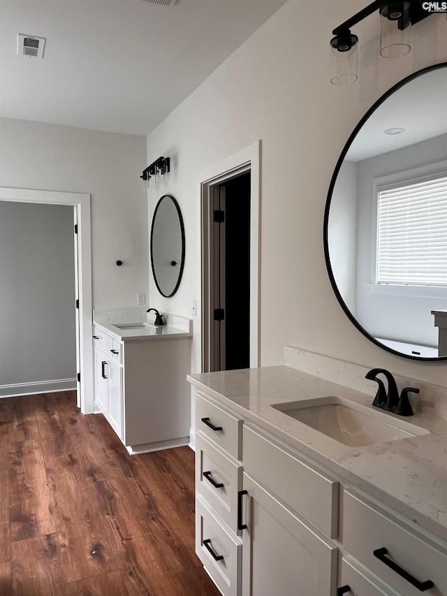 1781 Bookman Rd, Elgin, SC 29045 - bathroom with two vanities and wood finished floors