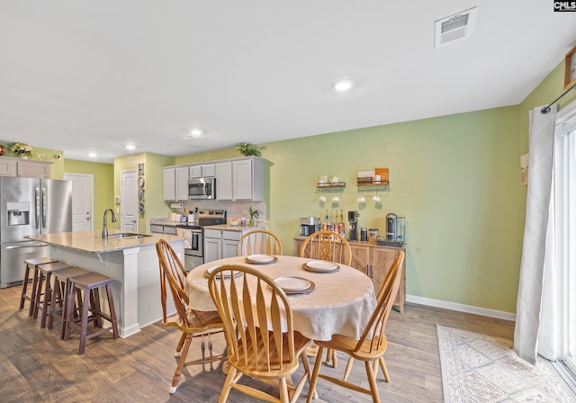 133 Plum Orchard Dr, West Columbia, SC 29170 - dining space featuring baseboards, recessed lighting, and light wood-type flooring