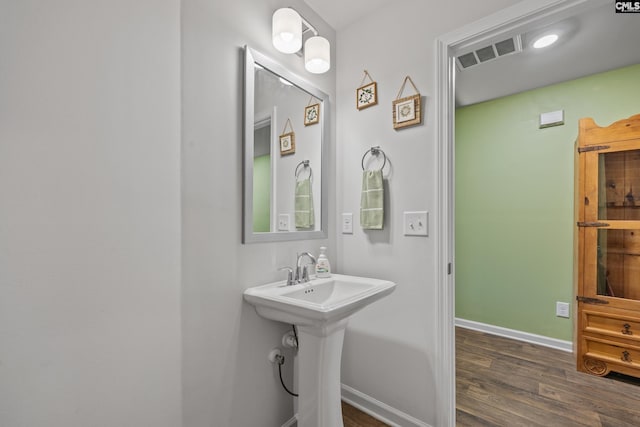 133 Plum Orchard Dr, West Columbia, SC 29170 - bathroom with wood finished floors and baseboards
