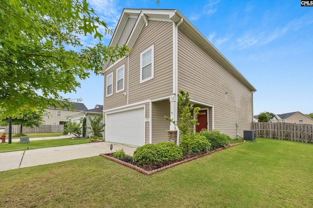 133 Plum Orchard Dr, West Columbia, SC 29170 - view of side of home with an attached garage, central AC, and driveway