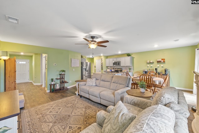 133 Plum Orchard Dr, West Columbia, SC 29170 - living room with light wood-style floors, a ceiling fan, baseboards, and recessed lighting