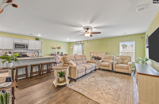 133 Plum Orchard Dr, West Columbia, SC 29170 - living area with wood finished floors, a ceiling fan, and recessed lighting