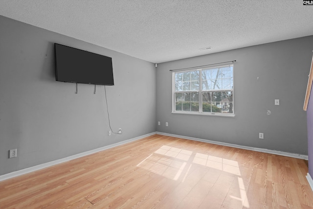 2 Berry Ridge Ct, Columbia, SC 29229 - unfurnished room featuring a textured ceiling, wood finished floors, and baseboards