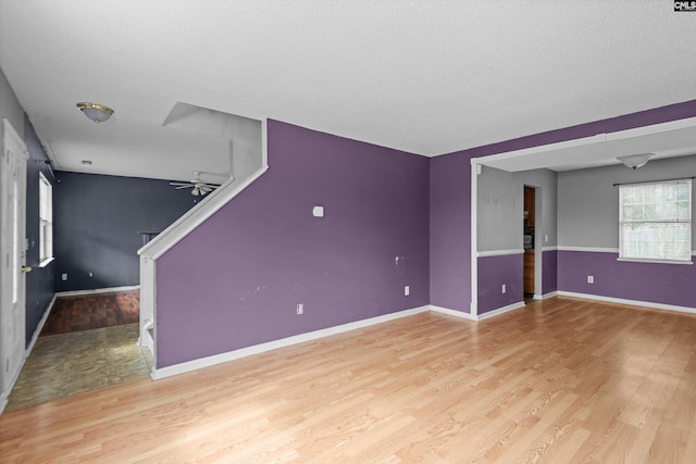 2 Berry Ridge Ct, Columbia, SC 29229 - unfurnished living room featuring a ceiling fan, light wood finished floors, stairway, and baseboards